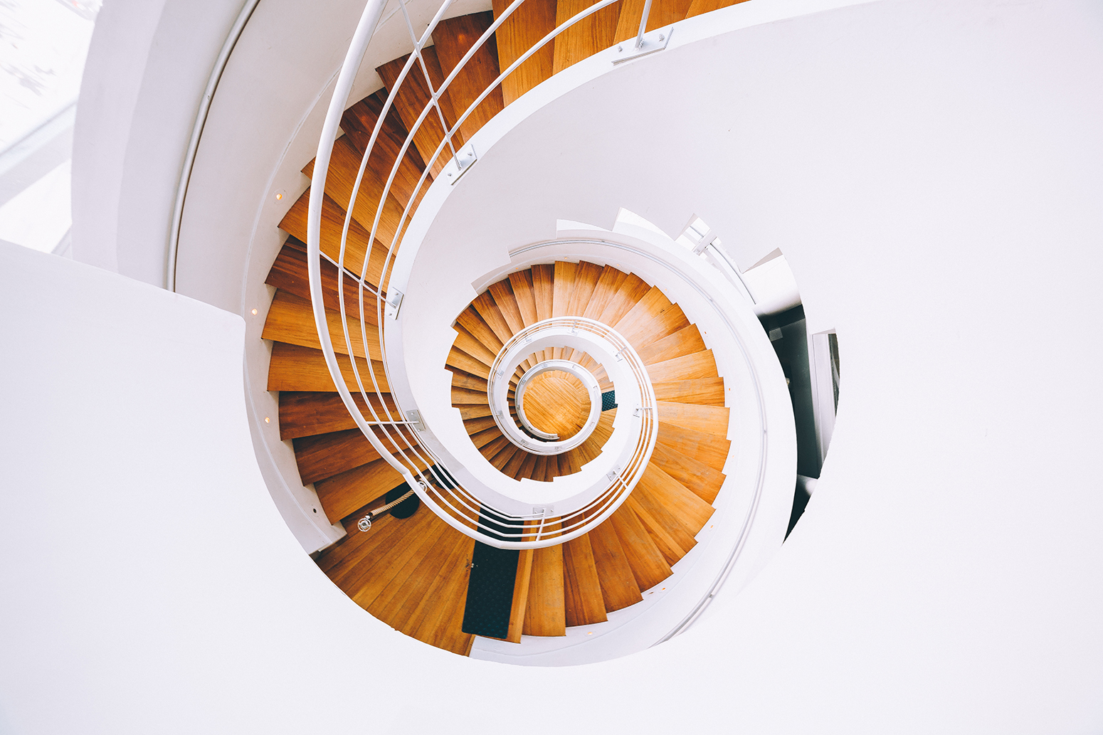 This vector illustration showcases a spiral staircase design, employing abstract art and circular architecture against a unique background.